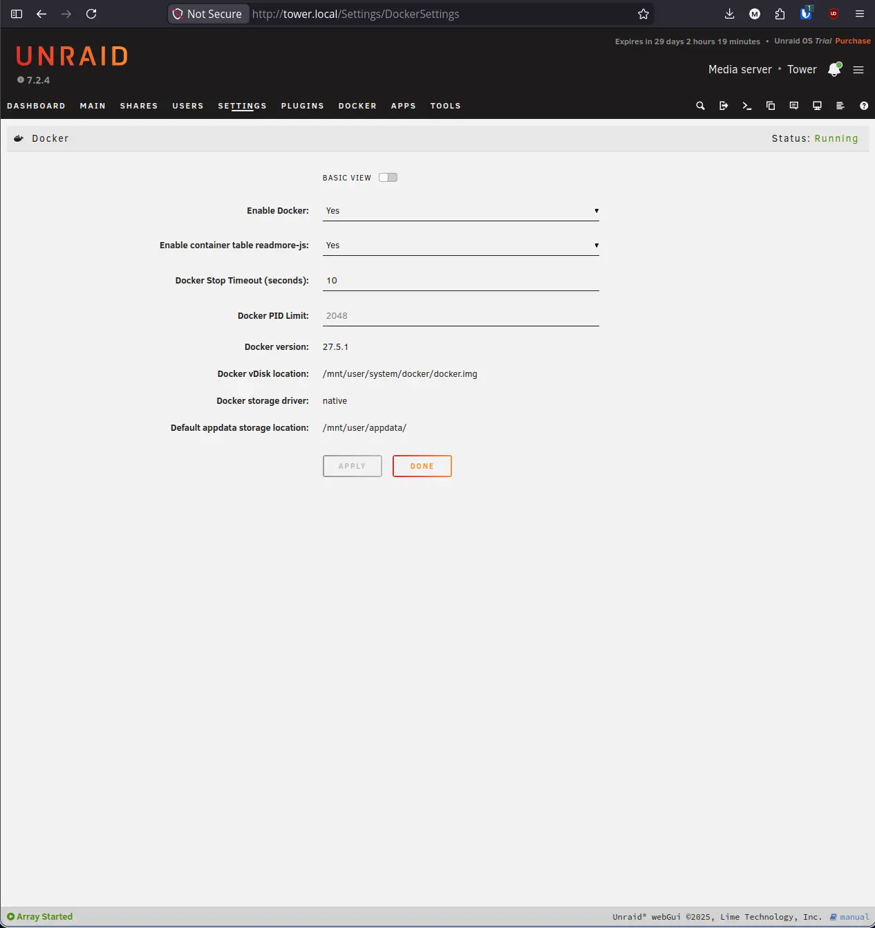 Docker Settings page showing Status: Running after applying